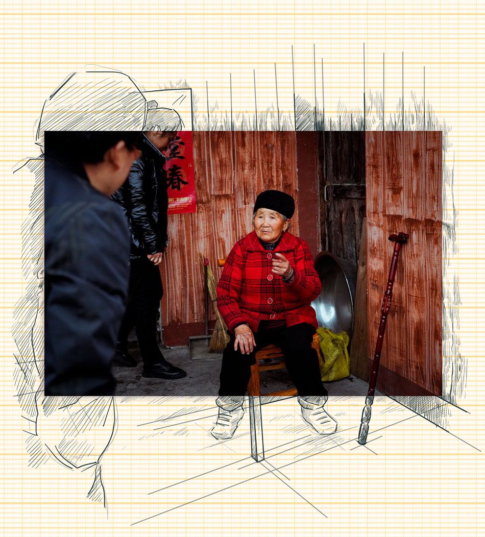 First Secretary Liu Yuanxue speaks with a local villager during routine home visits in the village of Danyang, Wanshan District, Guizhou Province, April 2021.